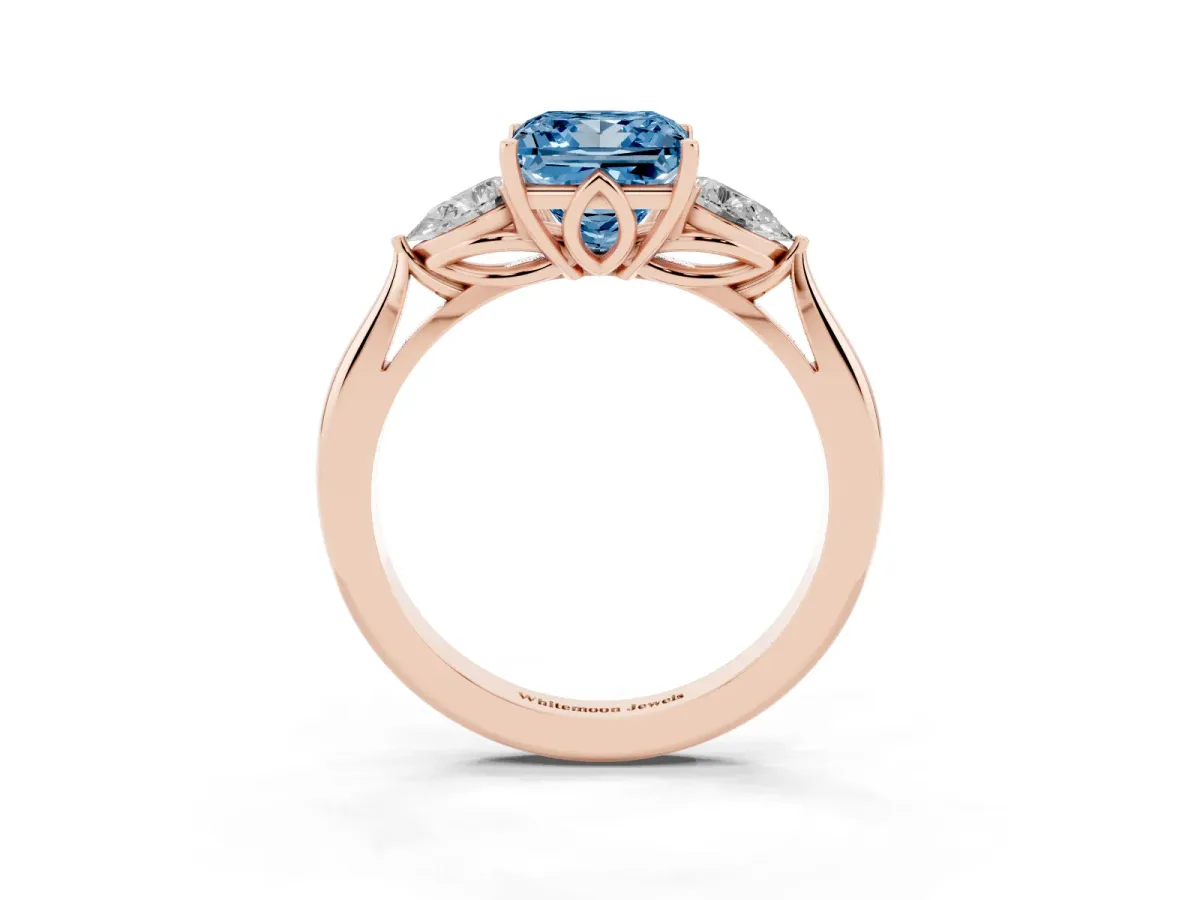 Fancy Blue Princess Cut Diamond Three-Stone Ring with Pear Side Stones and Prong Setting Rose gold