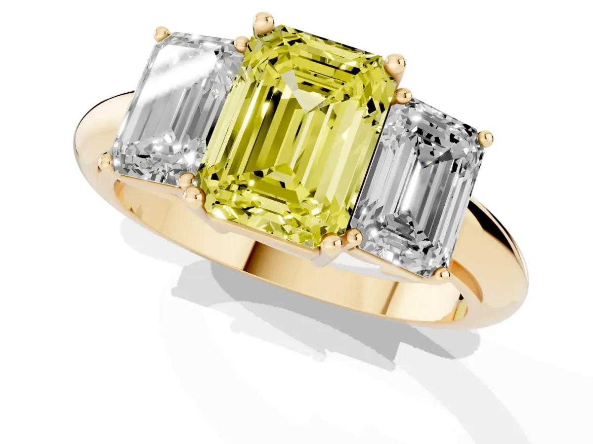 Fancy Yellow Three-Stone Emerald Cut Cut Diamond Engagement Ring with Prong Setting on a White Gold Band Yellow gold