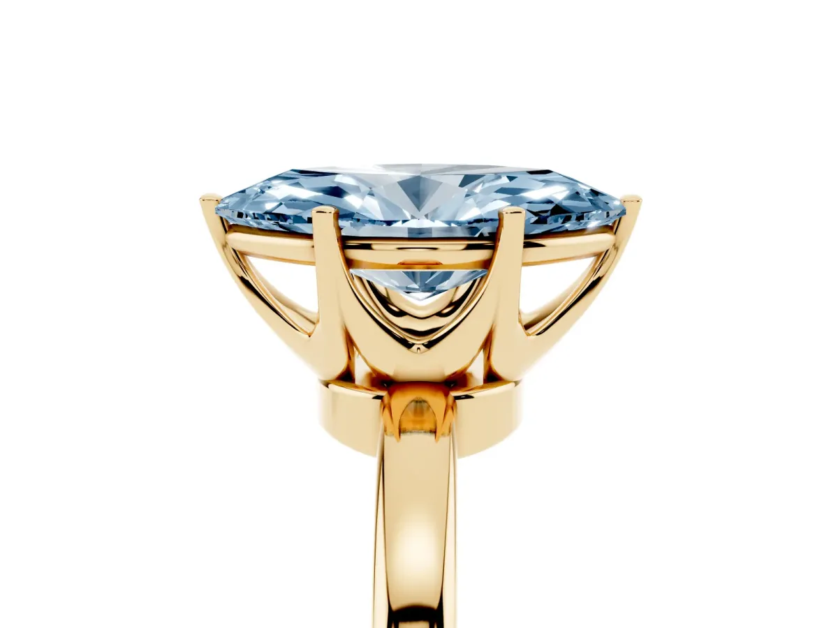 Fancy Blue Marquise Cut Solitaire Diamond Ring with Six-Prong Setting on a Classic Band Yellow gold
