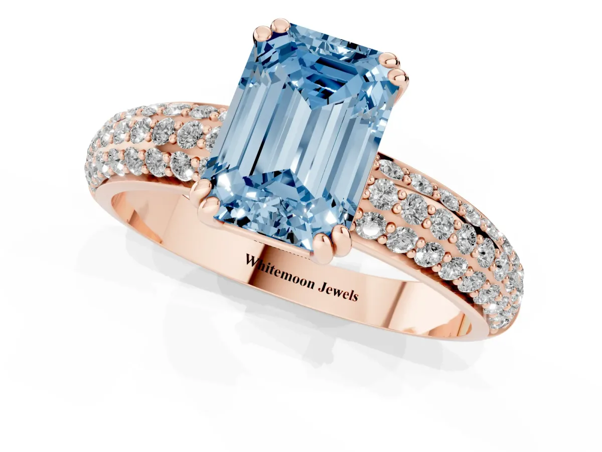 Fancy Blue Emerald Cut Diamond Solitaire Ring with Multi-Row Round Pavé Band and Prong Setting Rose gold