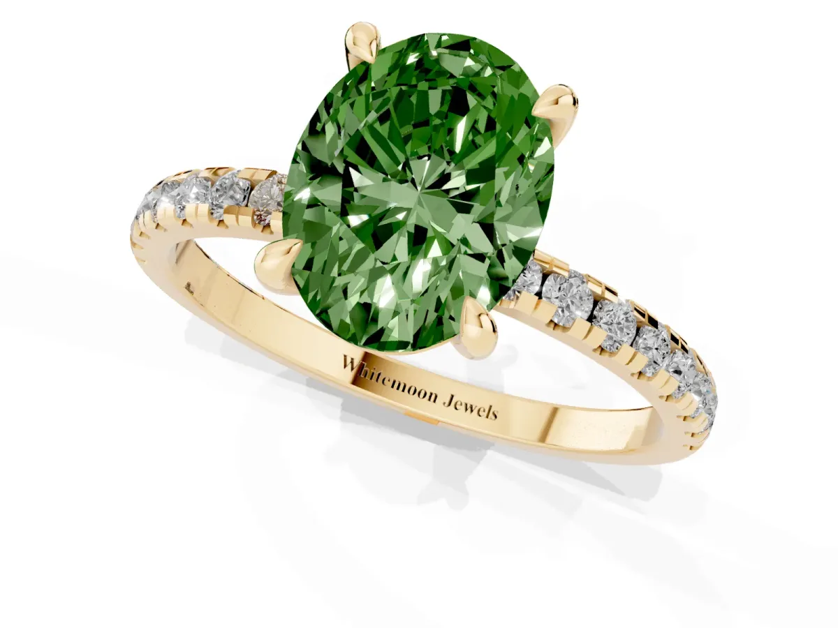 Fancy Green Oval Cut Diamond Brilliant Solitaire Ring with Pavé Band and Four-Prong Setting Yellow gold