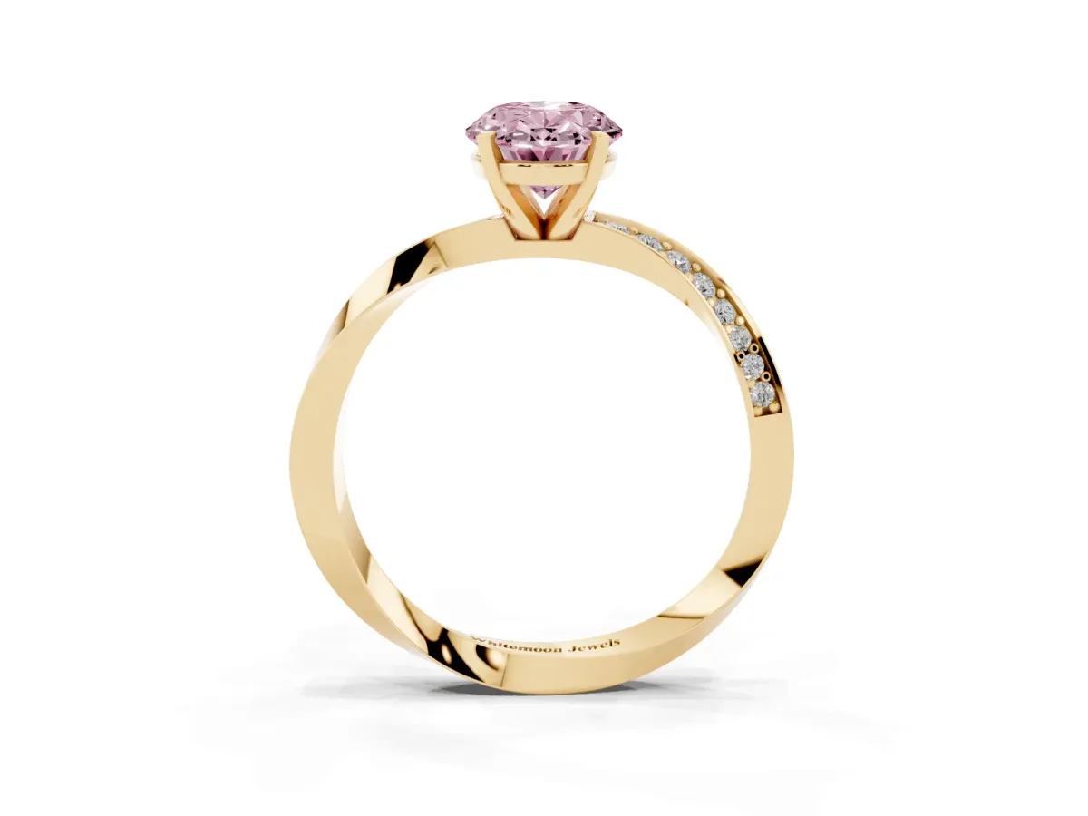 Fancy Pink Oval Cut Diamond Engagement Ring with Side Stone Accents and Four-Prong Setting Yellow gold