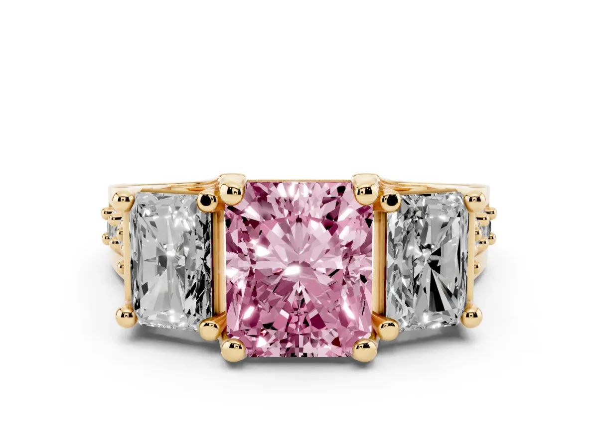 Fancy Pink Radiant Cut Diamond Three-Stone Ring with Channel Set Band and Four-Prong Setting Yellow gold