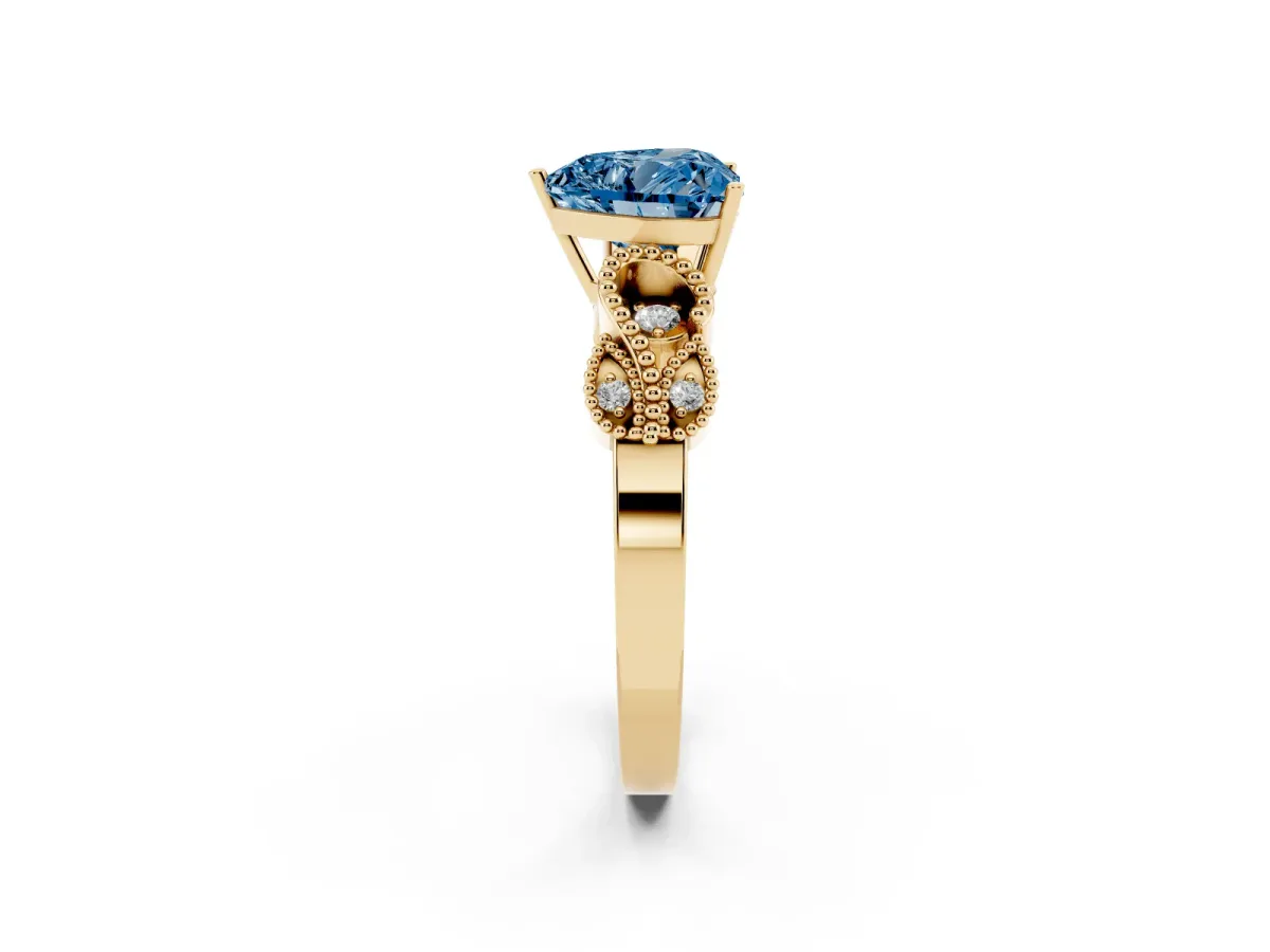 Fancy Blue Heart Cut Solitaire Milgrain Leaf Band with Prong Setting Yellow gold