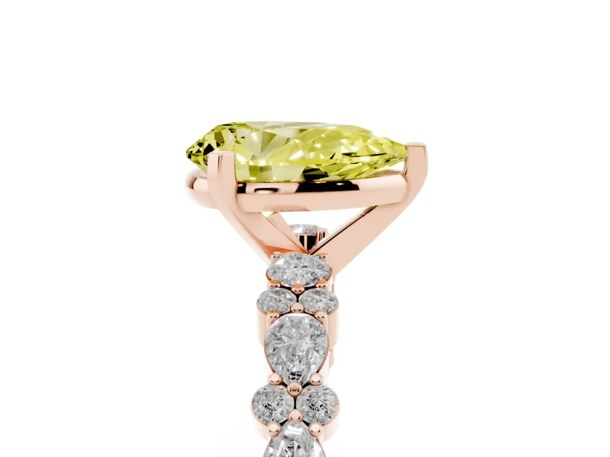 Fancy Yellow Pear Cut Diamond Side Stone Solitaire Ring with Round and Four-Prong Setting Rose gold