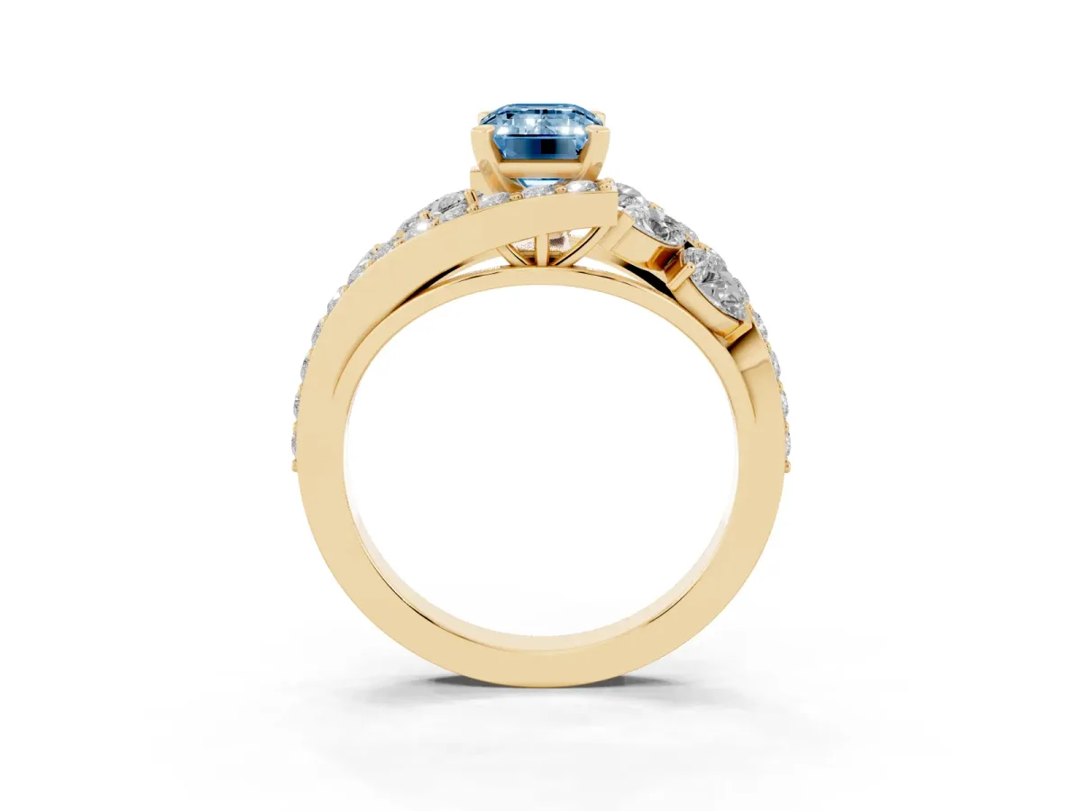 Fancy Blue Emerald Cut Diamond Halo Ring with Marquise and Pavé Band in Prong Setting Yellow gold