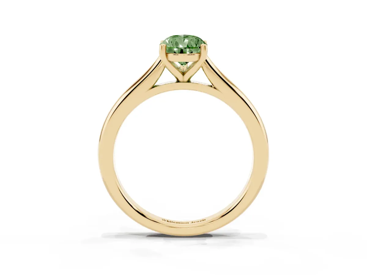 Fancy Green Pear Cut Cut Solitaire Ring with Cathedral Band and Four-Prong Setting Yellow gold
