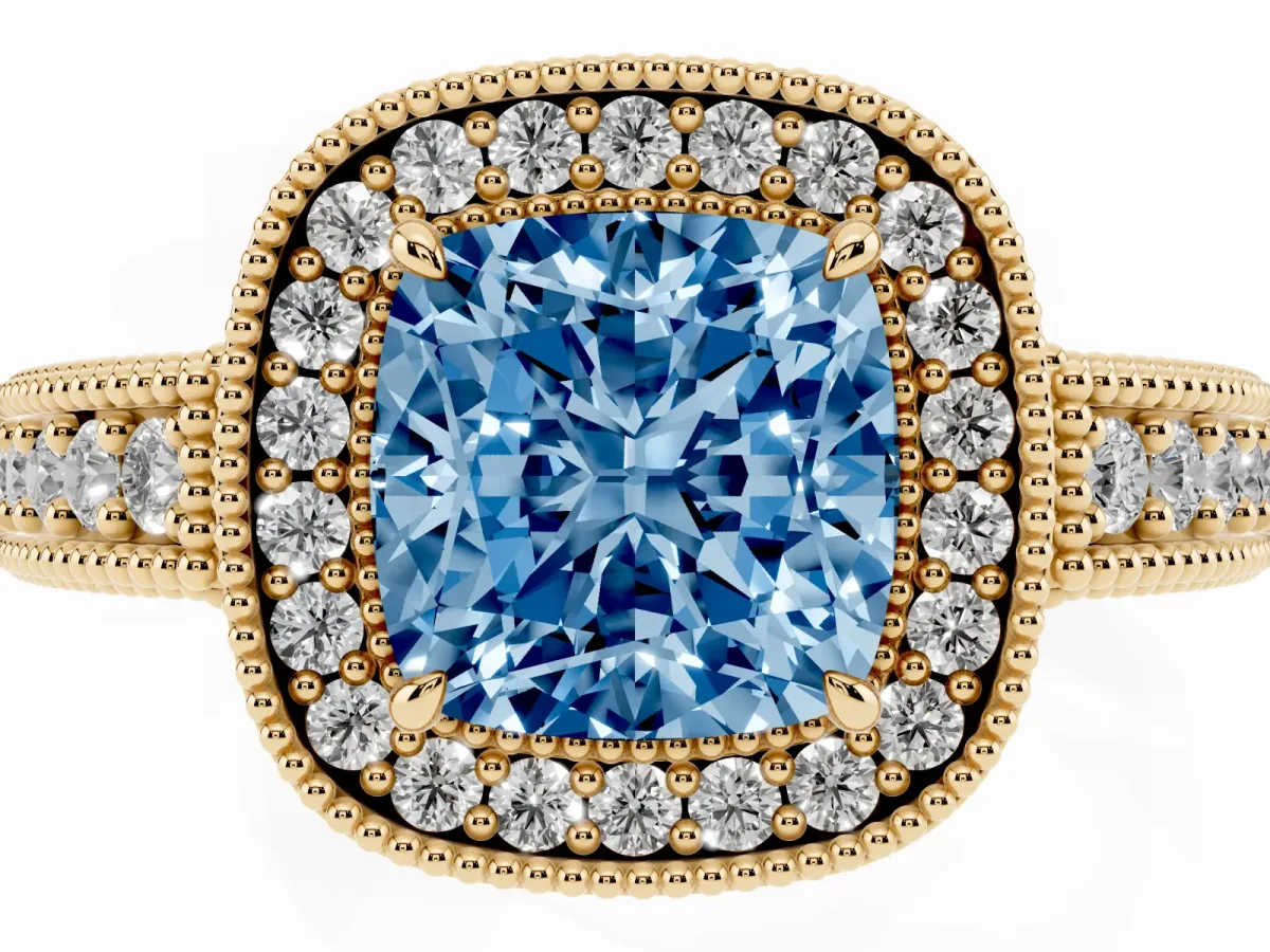 Fancy Blue Cushion Cut Cut Halo Diamond Ring with Pavé Band and Four-Prong Setting Yellow gold