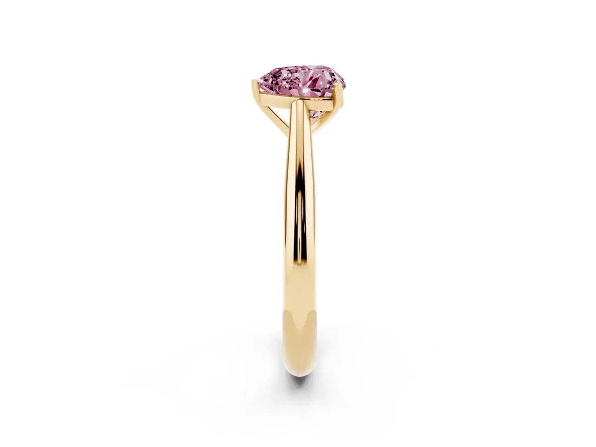 Fancy Pink Heart Cut Diamond Solitaire Engagement Ring with Cathedral Setting and Four-Prong Mount Yellow gold