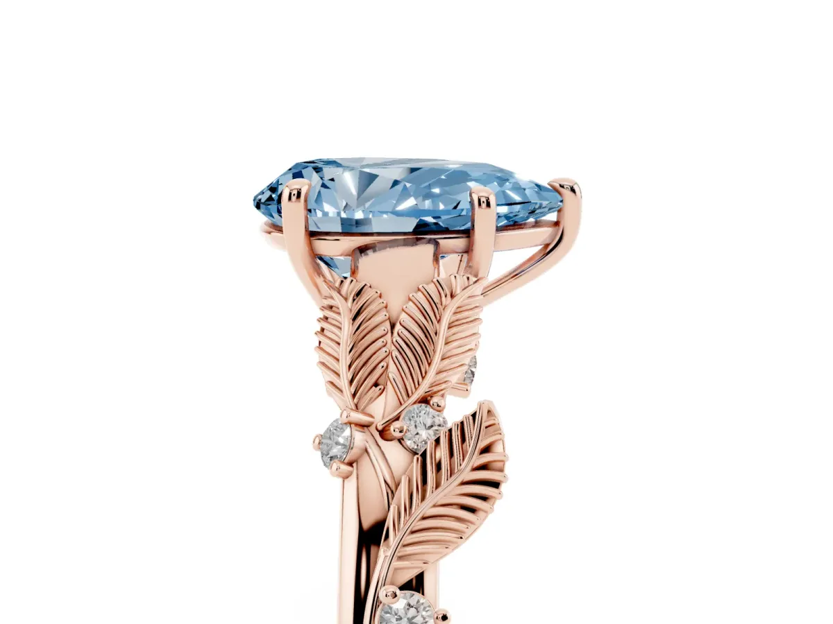 Fancy Blue Pear Cut Diamond Solitaire Ring with Leaf Motif Band and Four-Prong Setting Rose gold