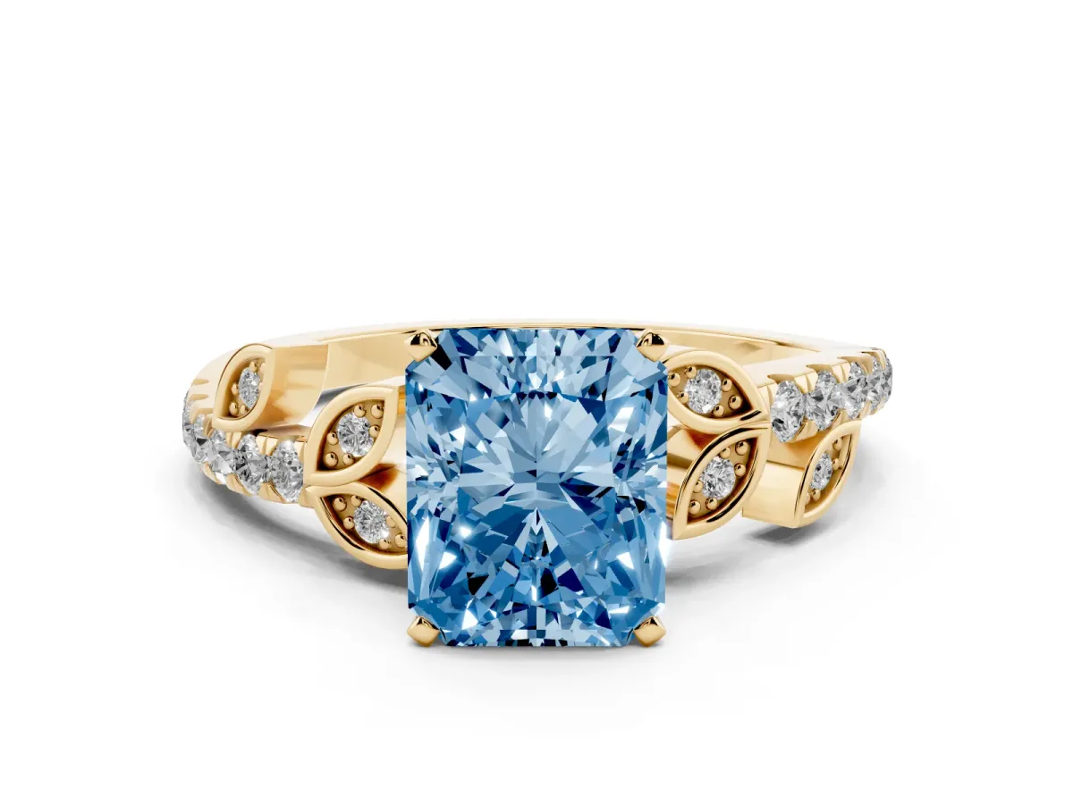 Fancy Blue Radiant Cut Solitaire Leaf-Inspired Diamond Ring with Pavé Band and Four-Prong Setting Yellow gold