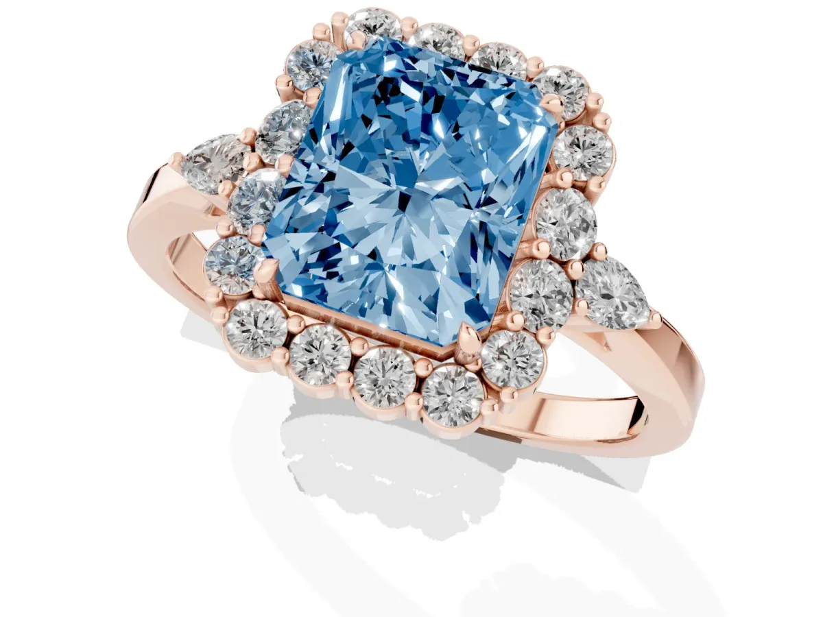 Fancy Blue Radiant Cut Diamond Halo Ring with Pear Side Stones and Prong Setting Rose gold