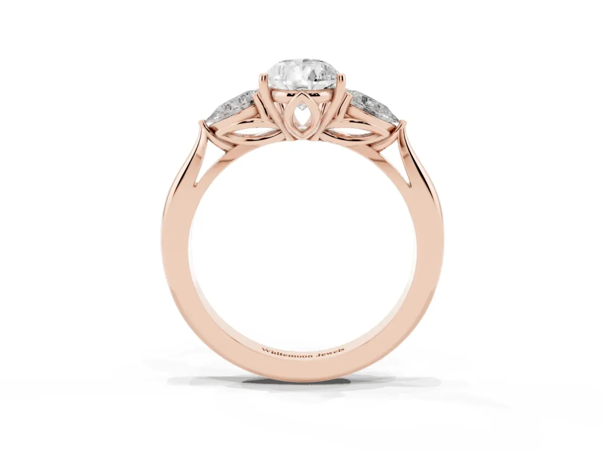 Three-Stone Pear Cut Brilliant Diamond Solitaire Ring with Tapered Band and Four-Prong Setting Rose gold