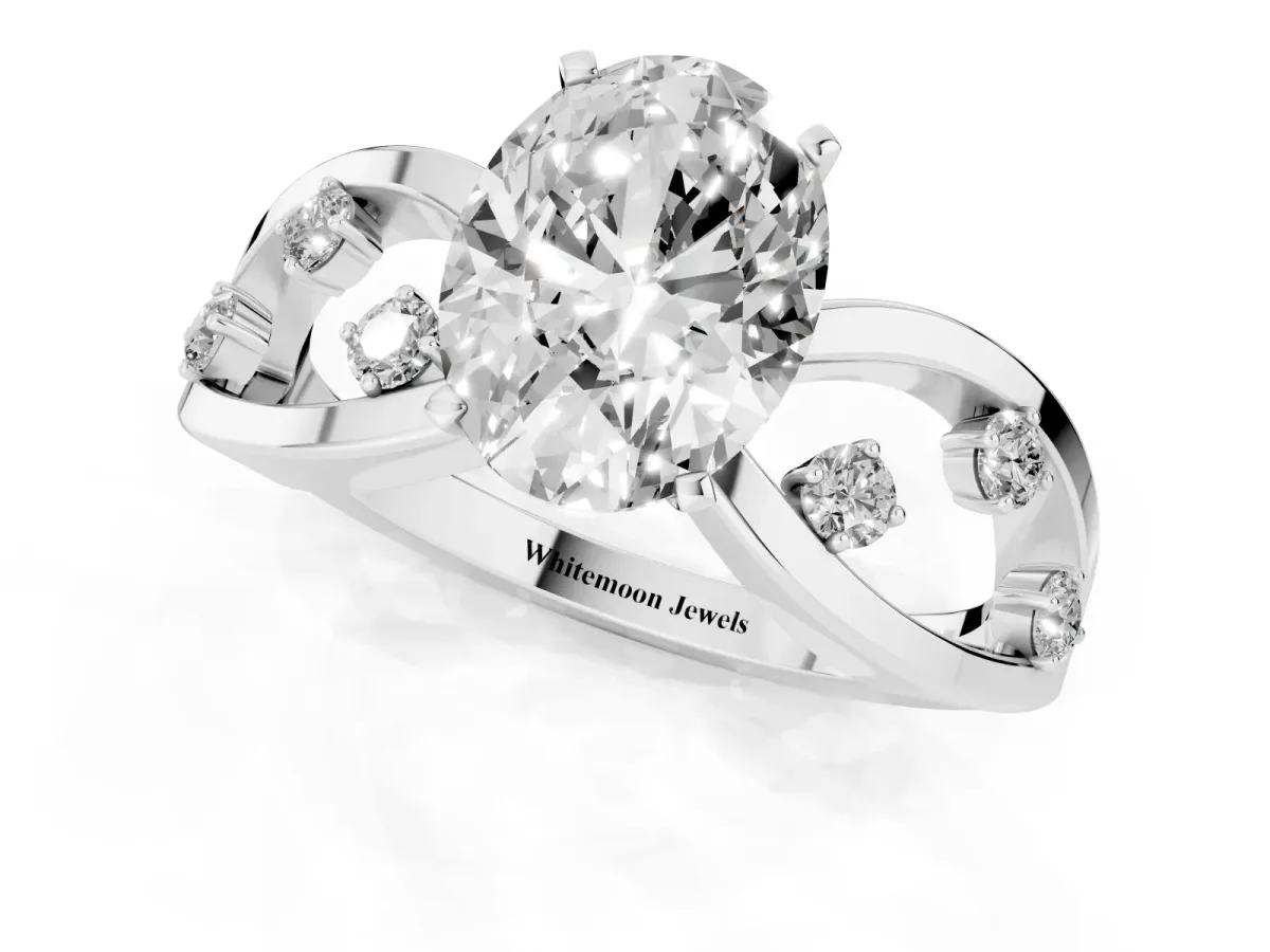 Oval Cut Cut Solitaire Diamond with Side Stones on Criss-Cross Band and Four-Prong Setting Silver