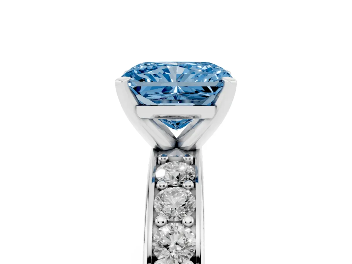 Fancy Blue Radiant Cut Diamond Engagement Ring with Channel Set Round Band and Prong Setting Silver