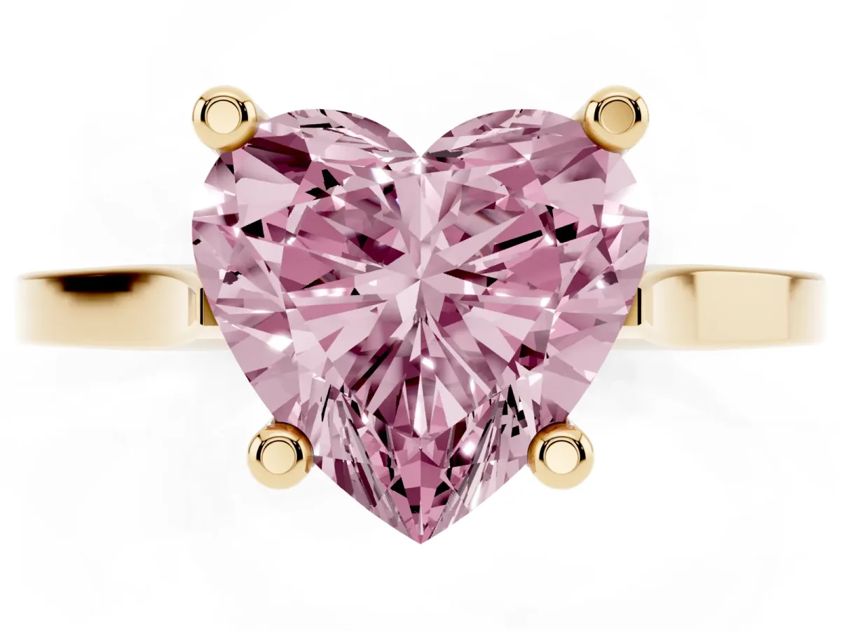 Fancy Pink Heart Cut Solitaire Diamond Ring with Four-Prong Setting and Tapered Band Yellow gold