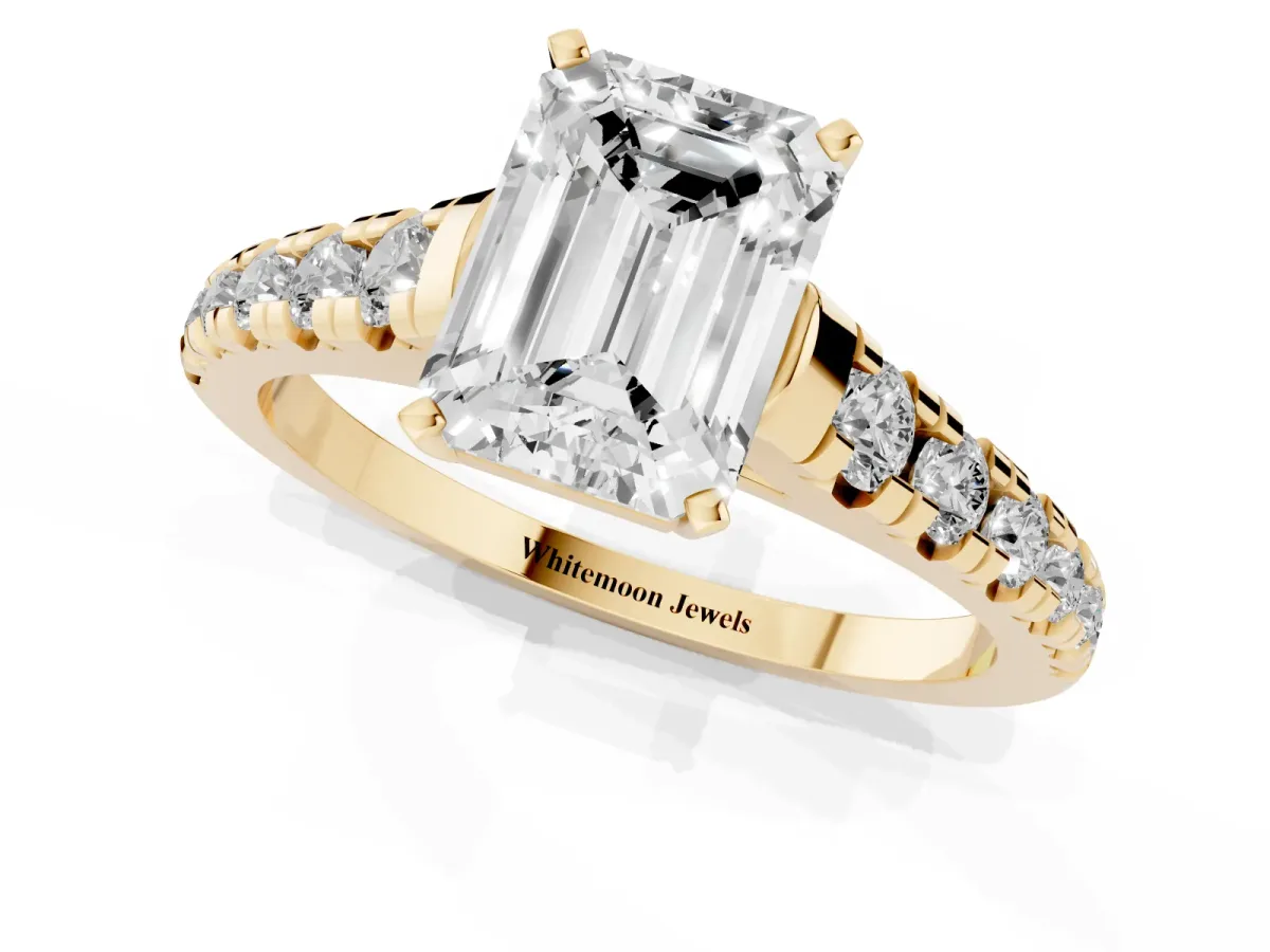 Emerald Cut Diamond Cathedral Solitaire Ring with Round Pavé Band Yellow gold