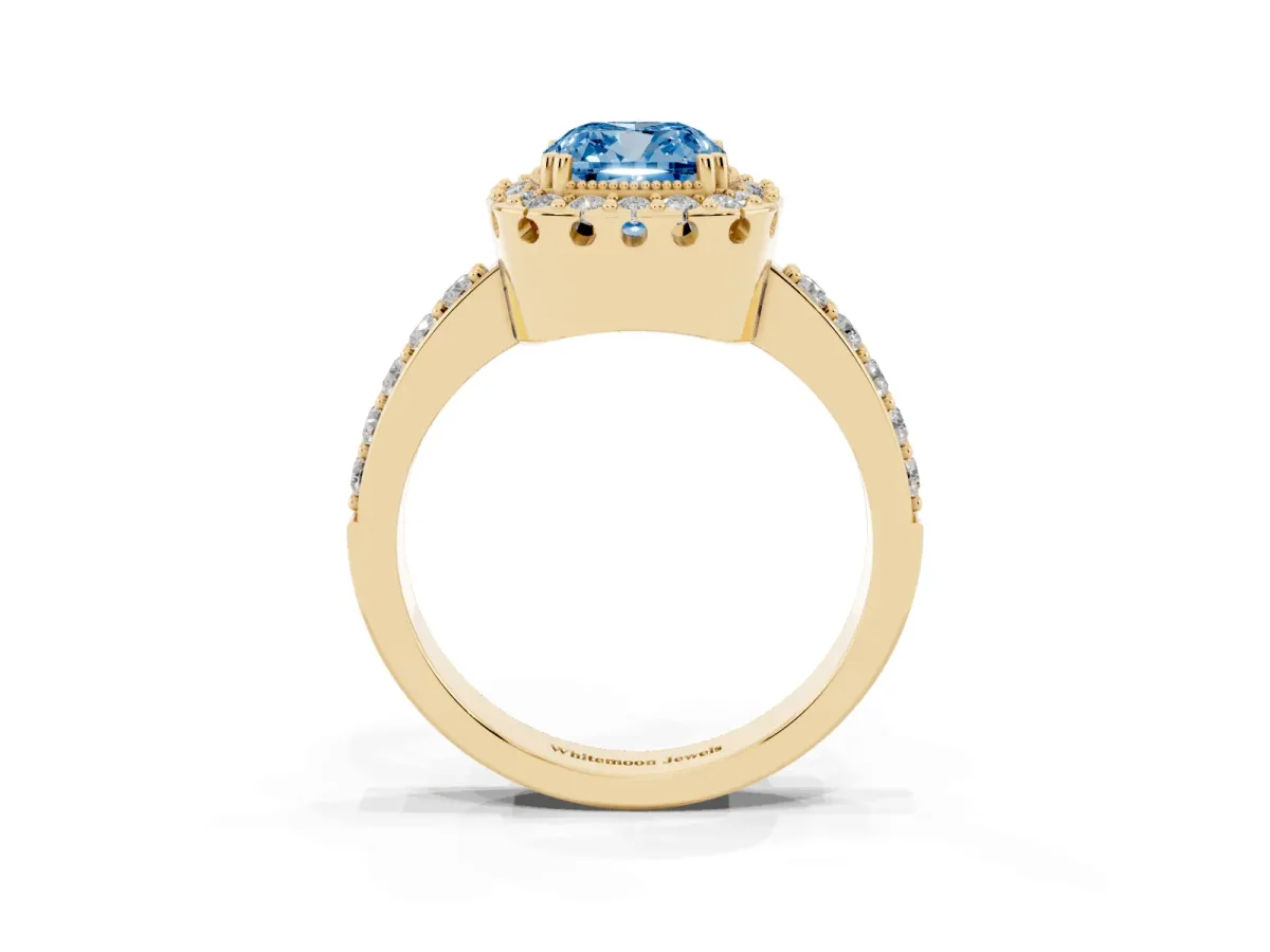 Fancy Blue Cushion Cut Diamond Halo Ring with Pavé Band and Prong Setting Yellow gold