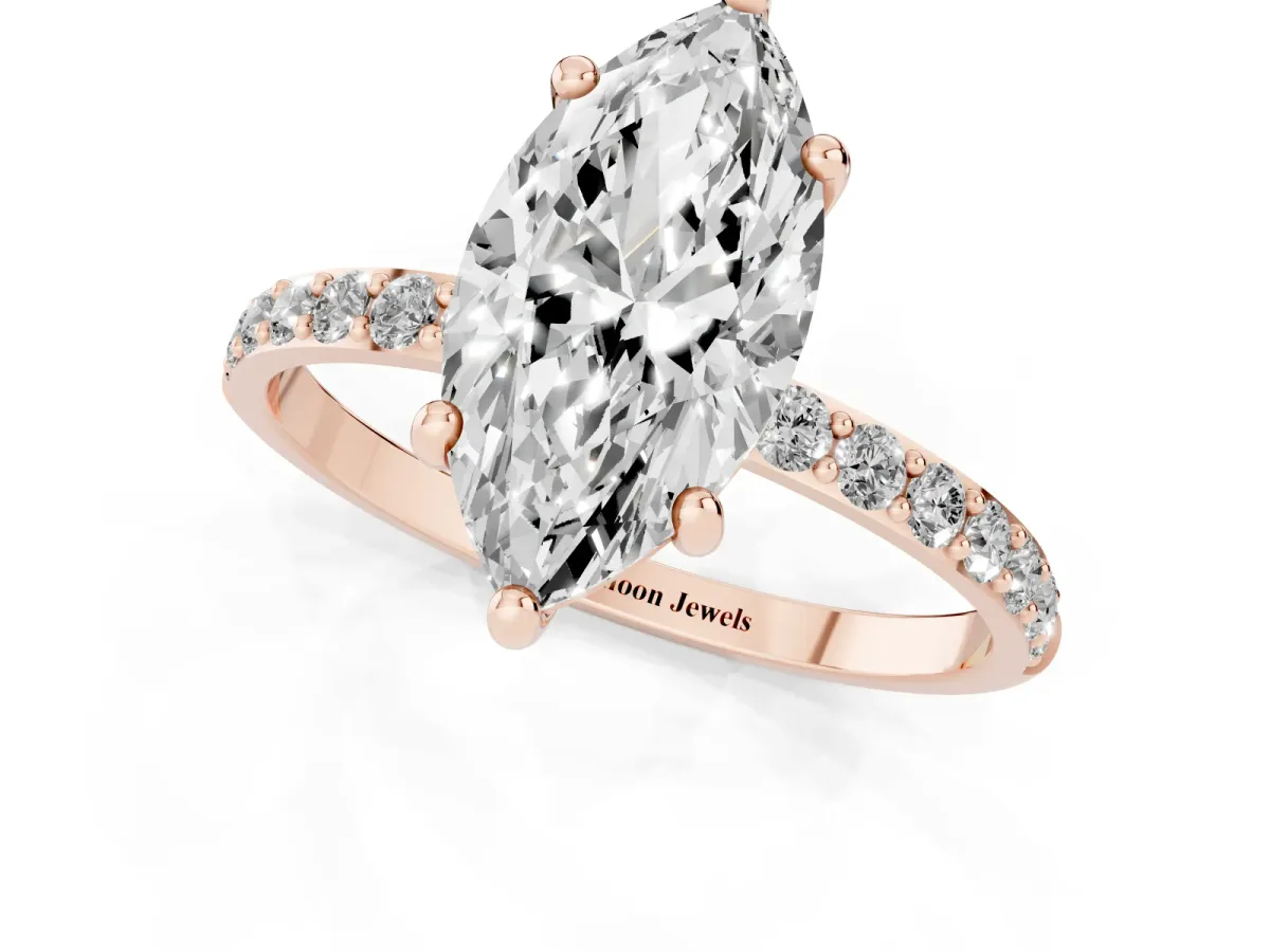 Marquise Cut Diamond Solitaire Ring with Round Pavé Band and Prong Setting Rose gold