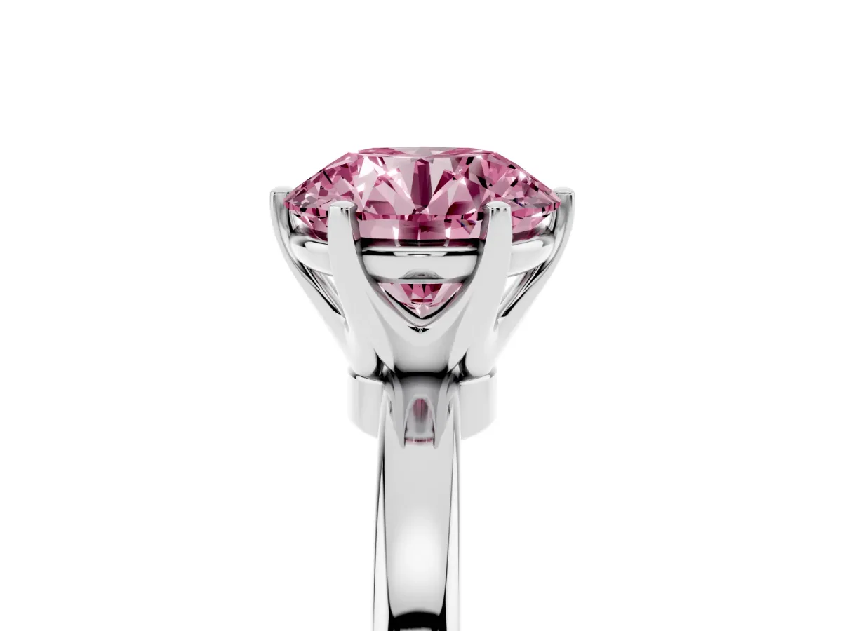 Fancy Pink Round Cut Solitaire Diamond Ring with Six-Prong Setting on a Classic Band Platinum