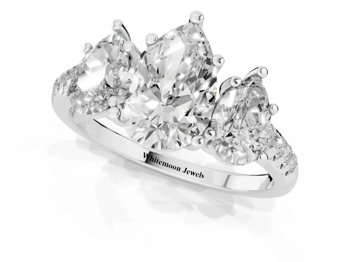 Three-Stone Pear Cut Diamond Ring with Round Pavé Band and Prong Setting Silver