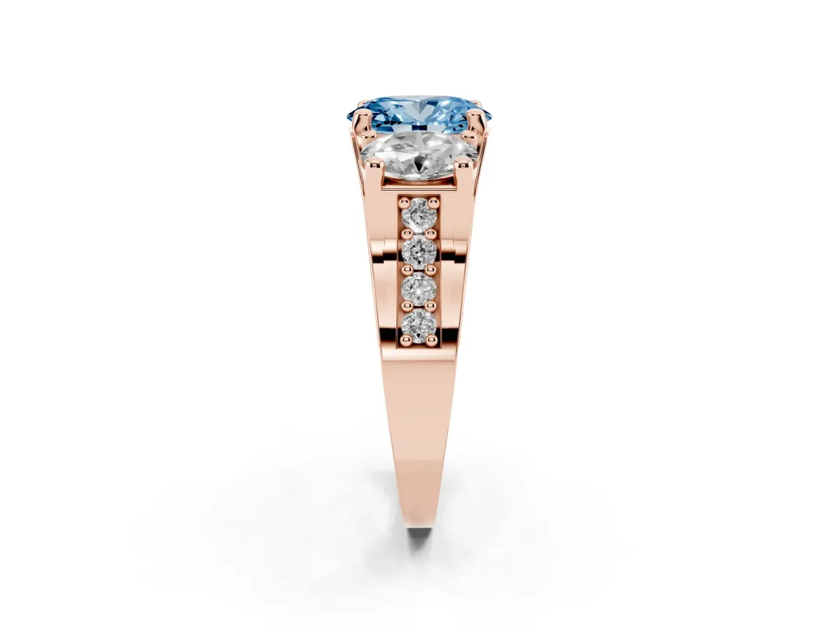 Fancy Blue Oval Cut Diamond Three-Stone Ring with Channel Set Band and Four-Prong Setting Rose gold