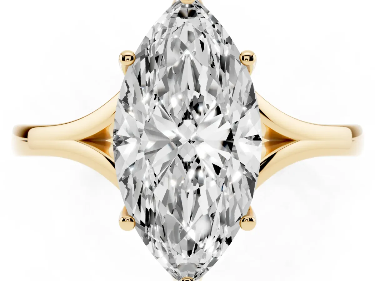 Marquise Cut Solitaire Diamond Ring with Six-Prong Setting and Tapered Band Yellow gold