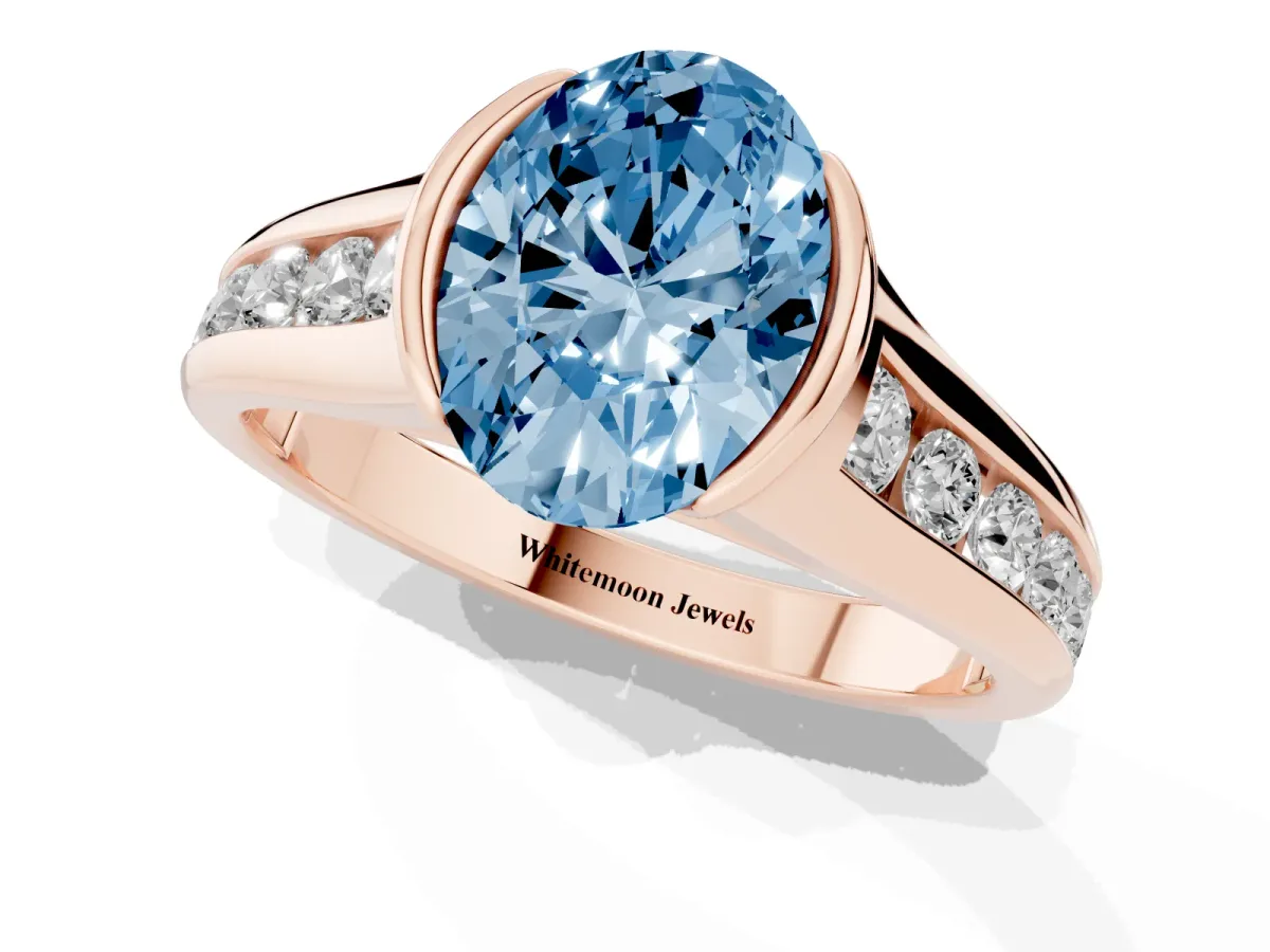 Fancy Blue Oval Cut Solitaire Bezel-Set Diamond Ring with Channel-Set Band Rose gold
