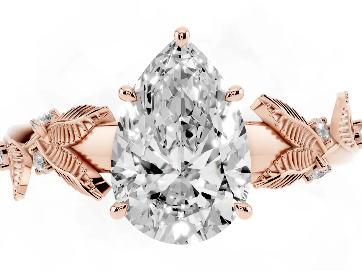 Pear Cut Diamond Solitaire Ring with Leaf Motif Band and Four-Prong Setting Rose gold