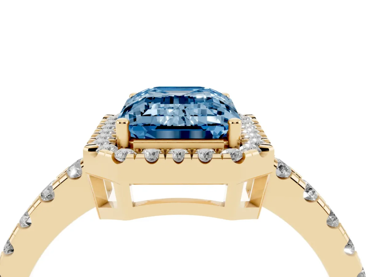 Fancy Blue Emerald Cut Diamond Halo Ring with Pavé Band and Four-Prong Setting Yellow gold