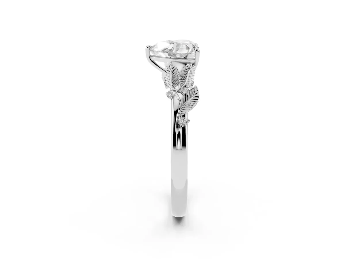 Heart Cut Diamond Solitaire Ring with Leaf Motif Band and Four-Prong Setting Silver