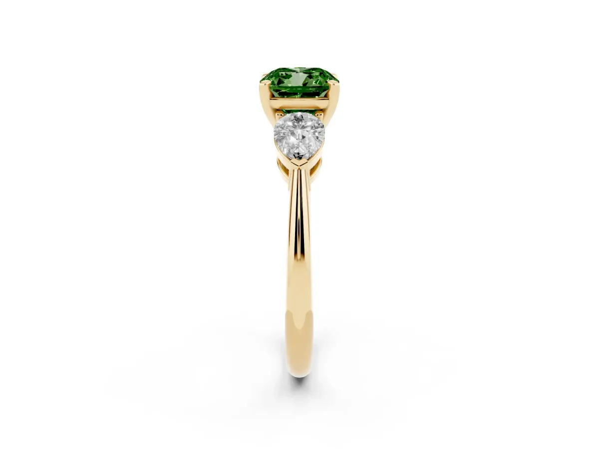 Fancy Green Three-Stone Cushion Cut Diamond Ring with Pear Side Stones and Four-Prong Setting Yellow gold