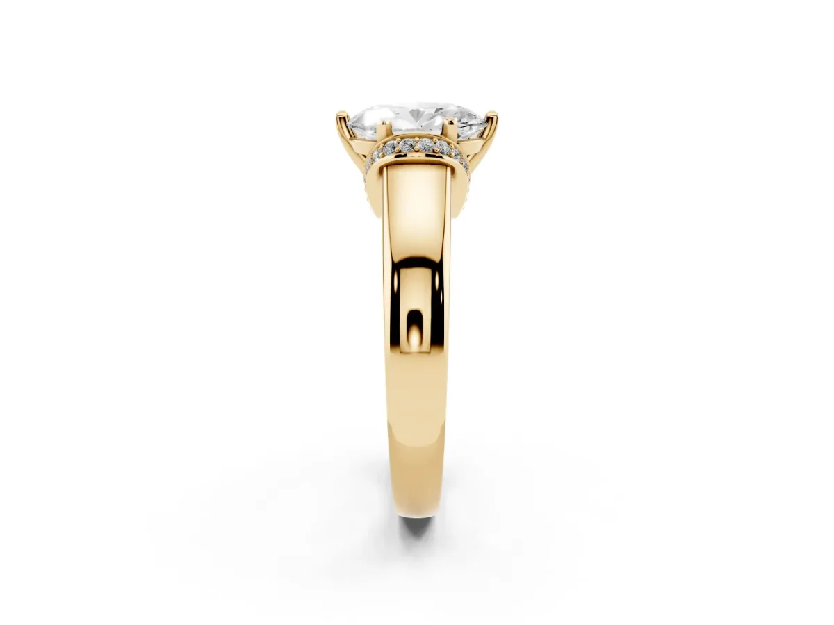 Oval Cut Solitaire Diamond Ring with Pave Band and Six-Prong Setting Yellow gold