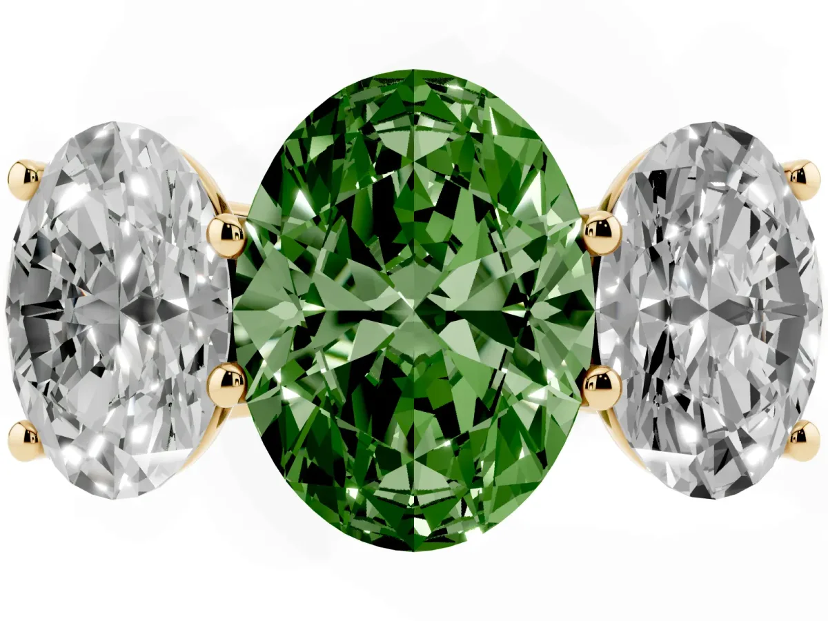 Fancy Green Oval Cut Three-Stone Diamond Ring with Prong Setting on a Classic Band Yellow gold