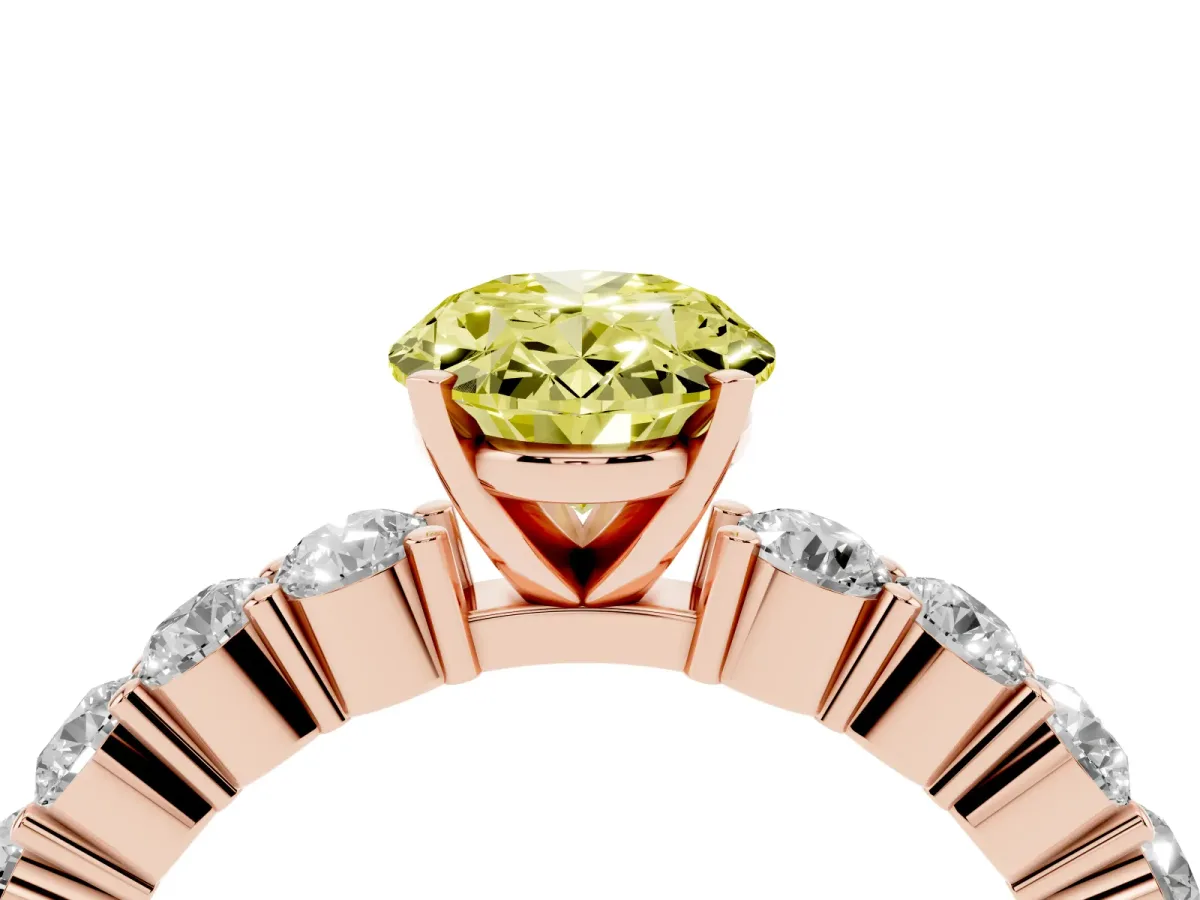 Fancy Yellow Oval Cut Diamond Solitaire Ring with Shared Prong Round Side Stones Rose gold