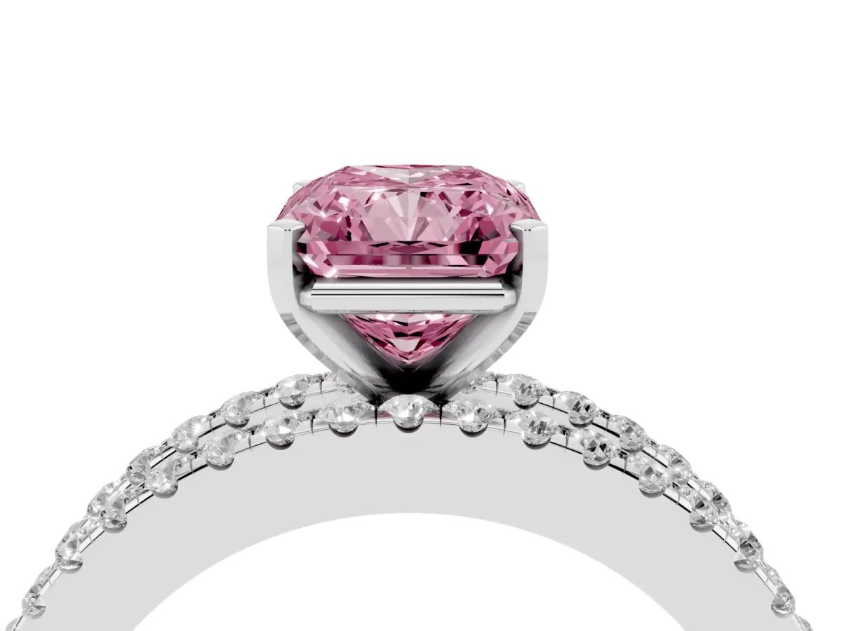 Fancy Pink Radiant Cut Diamond Solitaire Ring with Pavé and Channel Set Band Platinum