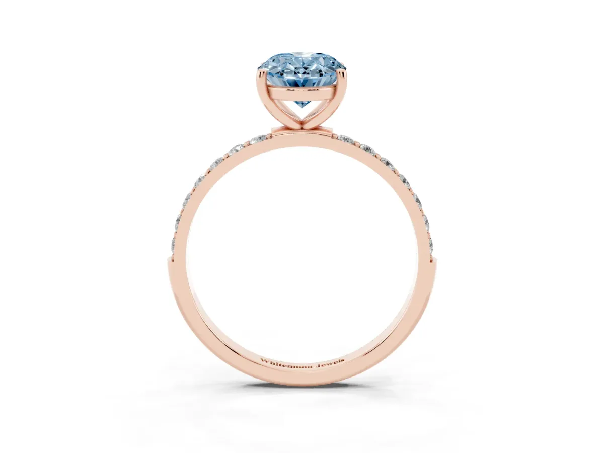 Fancy Blue Oval Cut Diamond Solitaire Ring with Round Pavé Shoulders and Prong Setting Rose gold