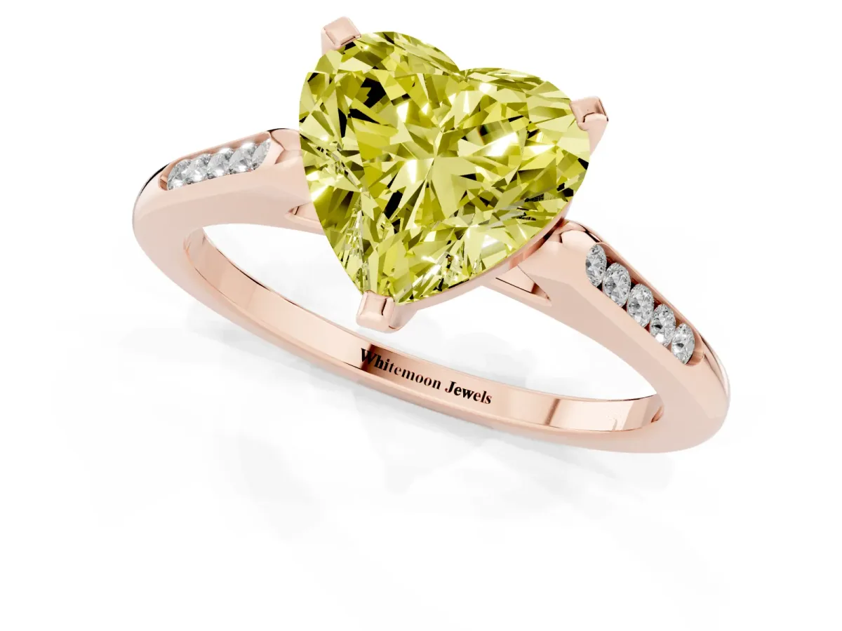 Fancy Yellow Heart Cut Diamond Solitaire Ring with Channel Set Round Band and Prong Setting Rose gold