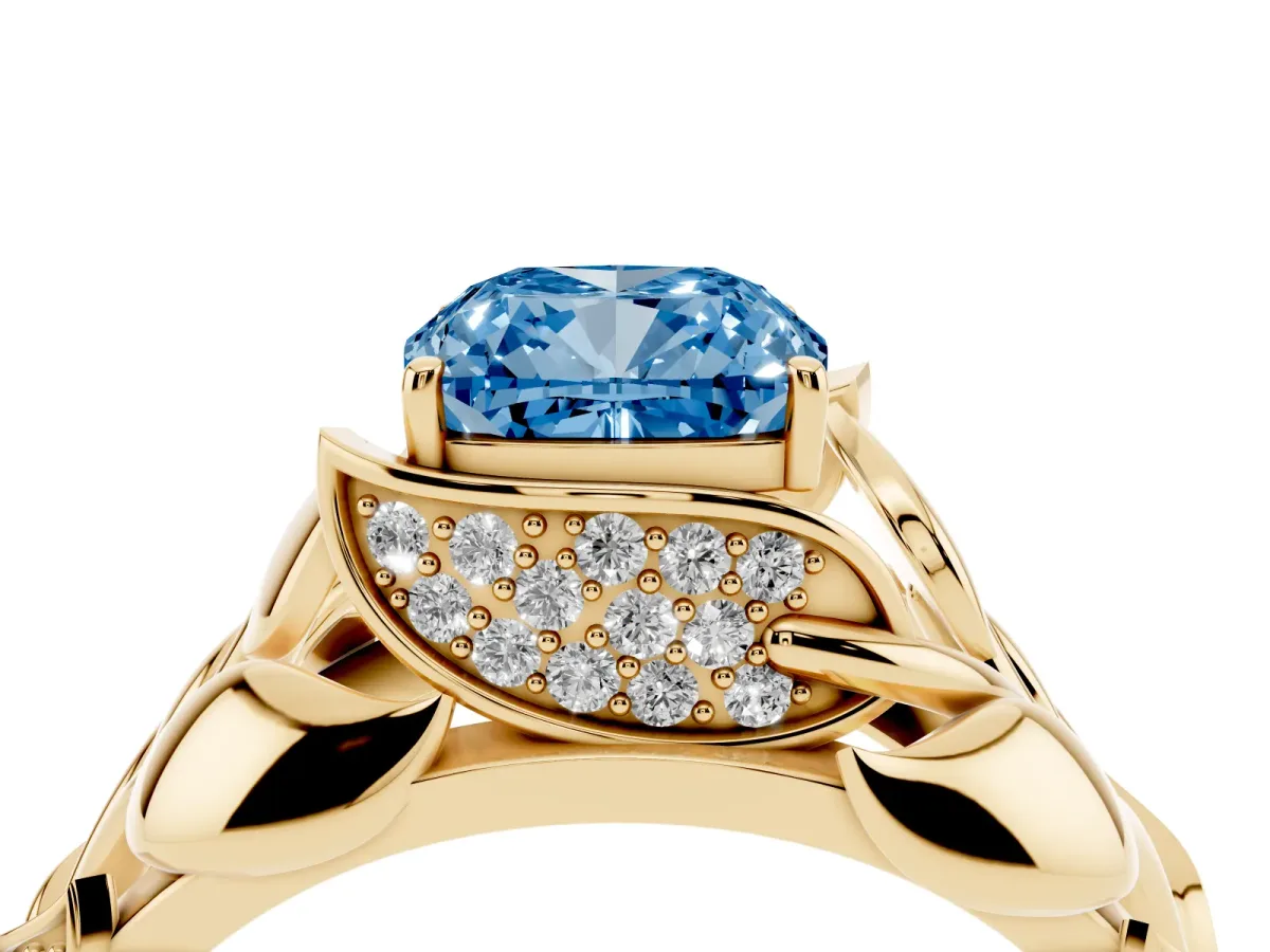 Fancy Blue Cushion Cut Diamond Leaf-Inspired Engagement Ring with Round Accents and Prong Setting Yellow gold