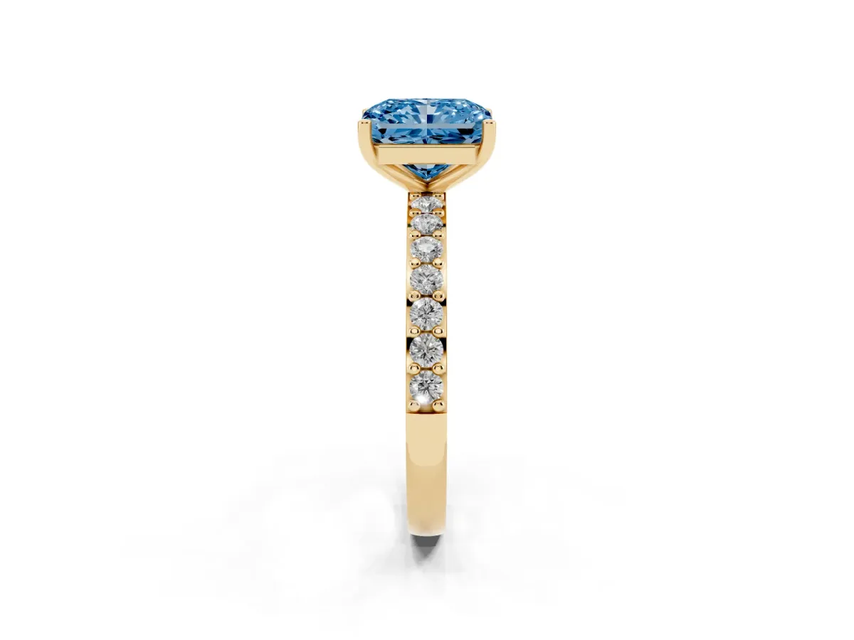 Fancy Blue Radiant Cut Cut Diamond Solitaire with Pave Band and Four-Prong Setting Yellow gold