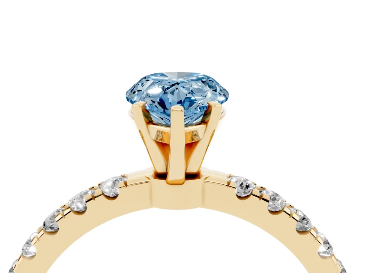 Fancy Blue Pear Cut Diamond Solitaire Ring with Pavé Accents and Four-Prong Setting Yellow gold