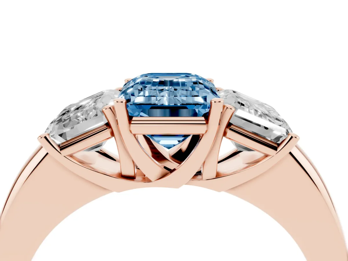 Fancy Blue Emerald Cut Diamond Three-Stone Ring with Four-Prong Setting and Classic Band Rose gold