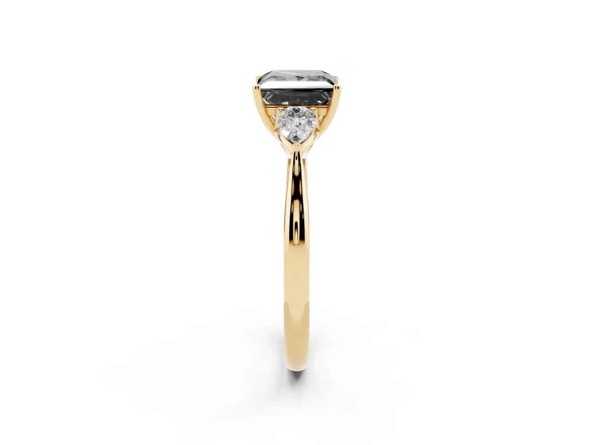 Fancy Black Princess Cut Diamond Three-Stone Ring with Pear Side Stones and Prong Setting Yellow gold