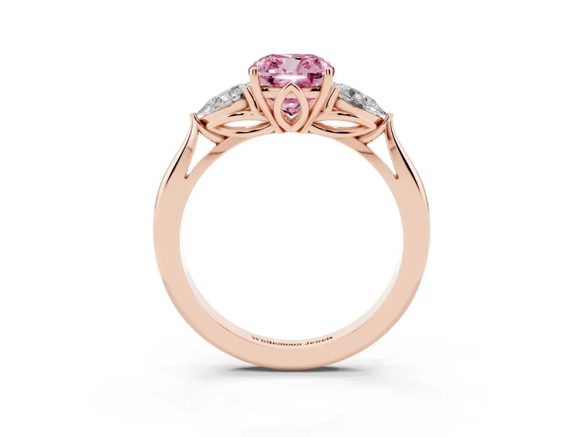 Fancy Pink Three-Stone Cushion Cut Diamond Ring with Pear Side Stones in Four-Prong Setting Rose gold