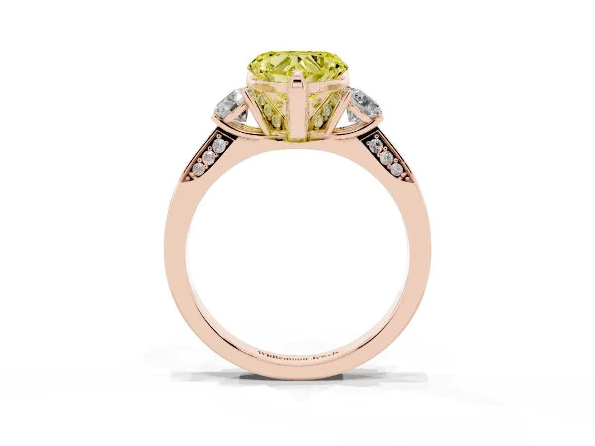 Fancy Yellow Heart Cut Brilliant Three-Stone Diamond Ring with Pavé Band and Four-Prong Setting Rose gold