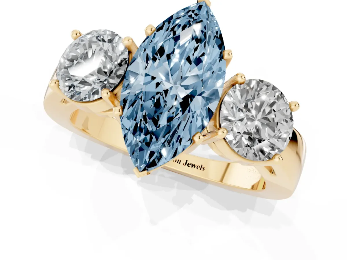 Fancy Blue Three-Stone Marquise Cut Diamond Ring with Round Side Stones, Classic Band, and Four-Prong Setting Yellow gold
