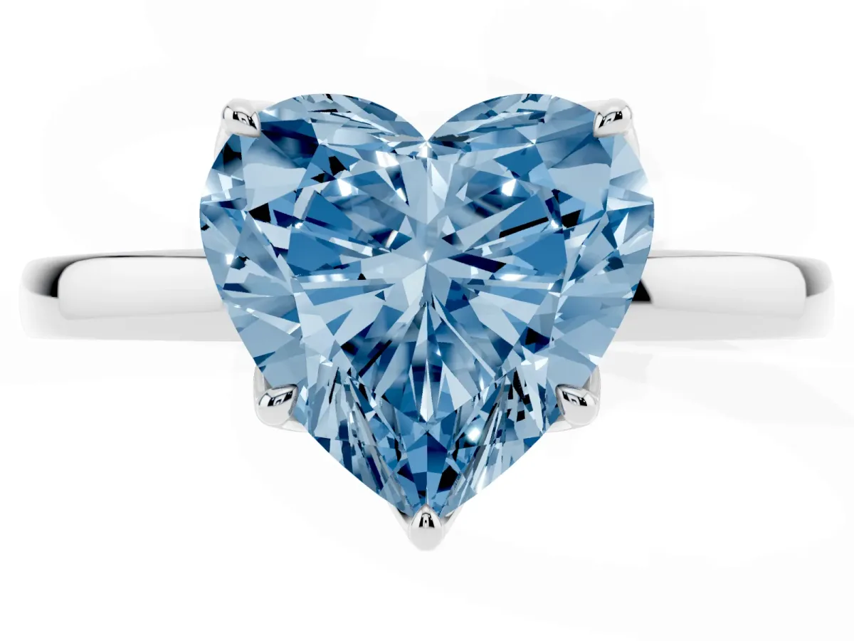 Fancy Blue Heart Cut Diamond Solitaire Ring with Thin Band and Prong Setting Silver