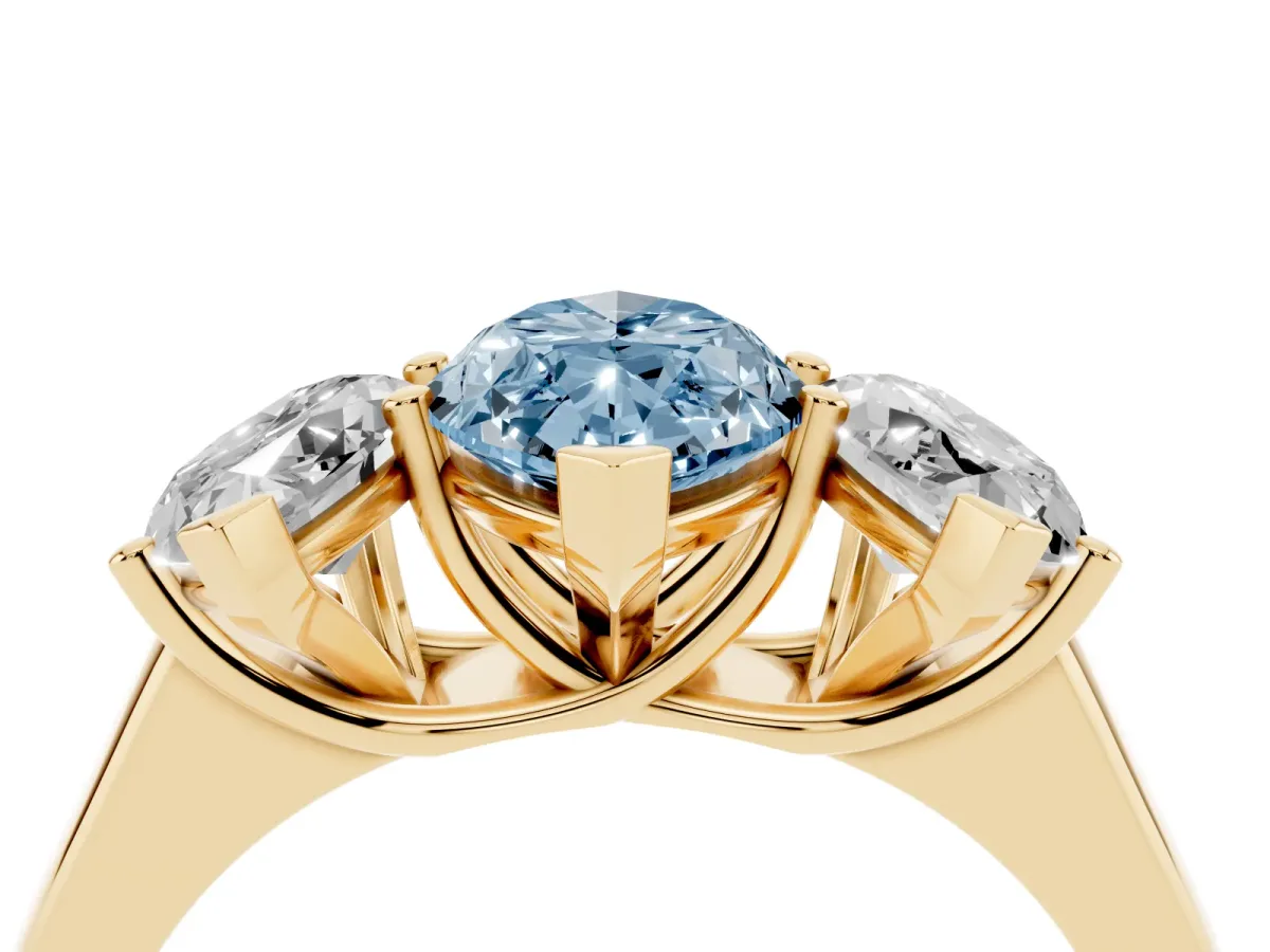 Fancy Blue Marquise Cut Three-Stone Diamond Ring with Prong Setting on a Classic Band Yellow gold