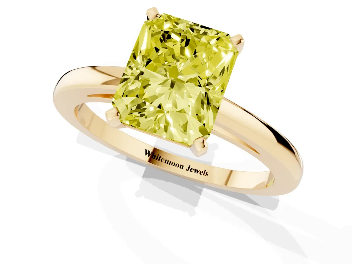 Fancy Yellow Radiant Cut Solitaire Diamond Engagement Ring with Four-Prong Setting on a Classic Band Yellow gold