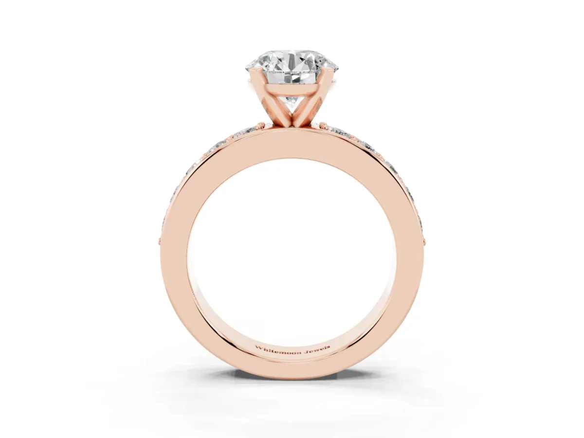 Round Cut Diamond Engagement Ring with Channel Set Round Band and Prong Setting Rose gold
